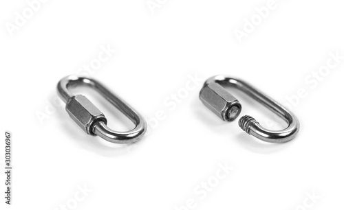Metal carabiner. Close up. Isolated on white background