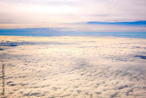 Fototapeta Naklejka Na Ścianę i Meble -  landscape look down from the airplane look see the sky and cloud beautiful beautiful in the morning appropriate the background , idea copy space