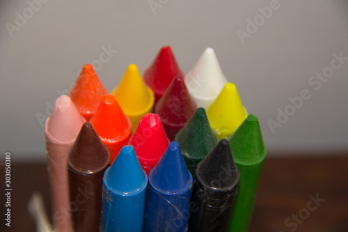 colored pencils on black background