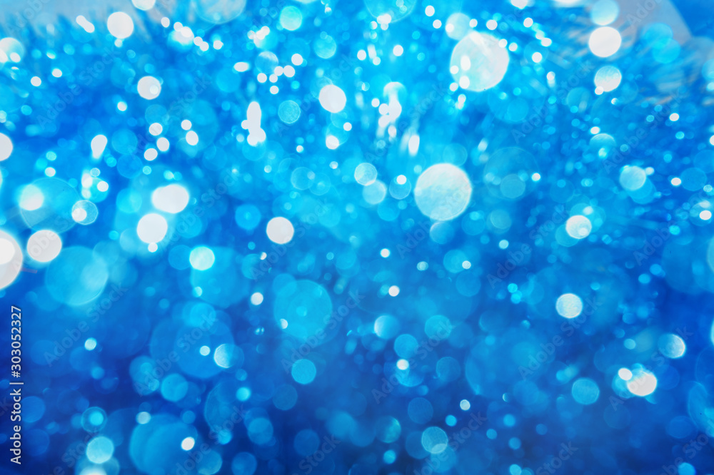 Abstract blue color bokeh. Christmas background