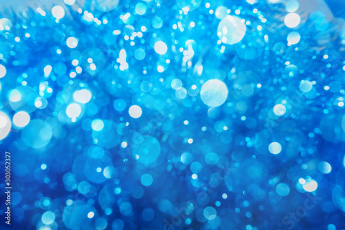 Abstract blue color bokeh. Christmas background