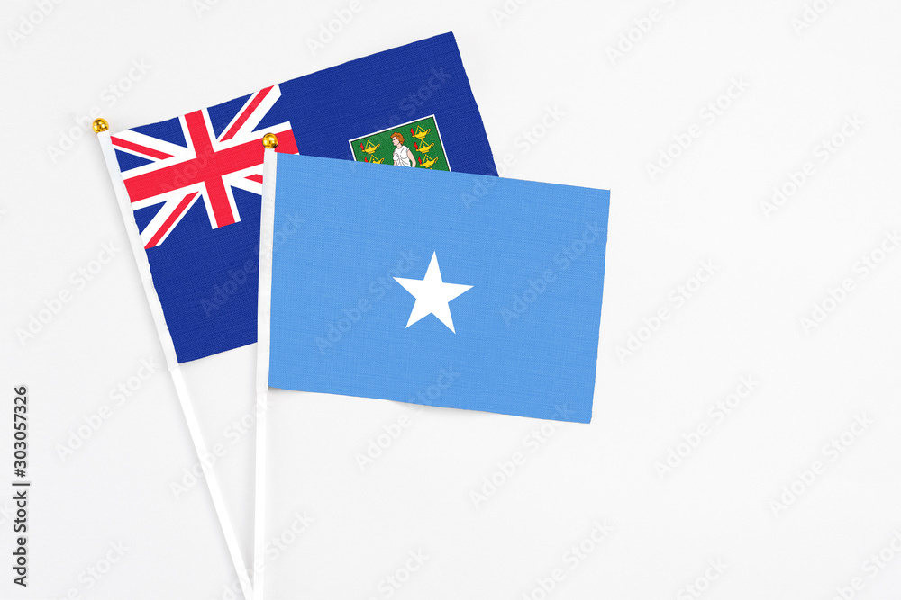 Somalia and British Virgin Islands stick flags on white background. High quality fabric, miniature national flag. Peaceful global concept.White floor for copy space. Somalia and British Virgin Islands stick flags on white background. High quality fabric, miniature national flag. Peaceful global concept.White floor for copy space.