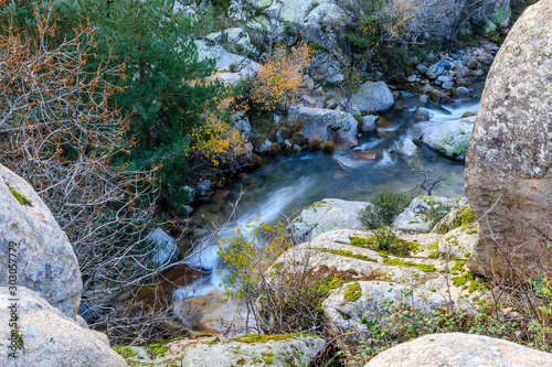 River in La Pedriza, in the mountains of Madrid, area characterized by large granite rocks