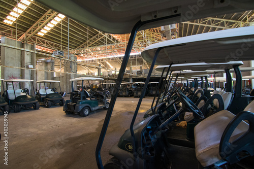 alot of Golf carts are parking in garage 