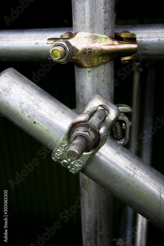 Galvanised steel scaffolding coupling connection on construction site 