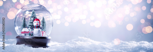 Snow globe on festive background