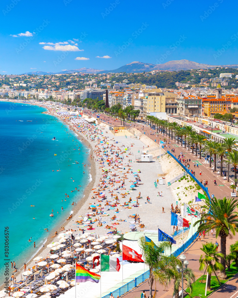Promenade des Anglais in Nice, France. Nice is a popular Mediterranean tourist destination, attracting 4 million visitors each year - obrazy, fototapety, plakaty 