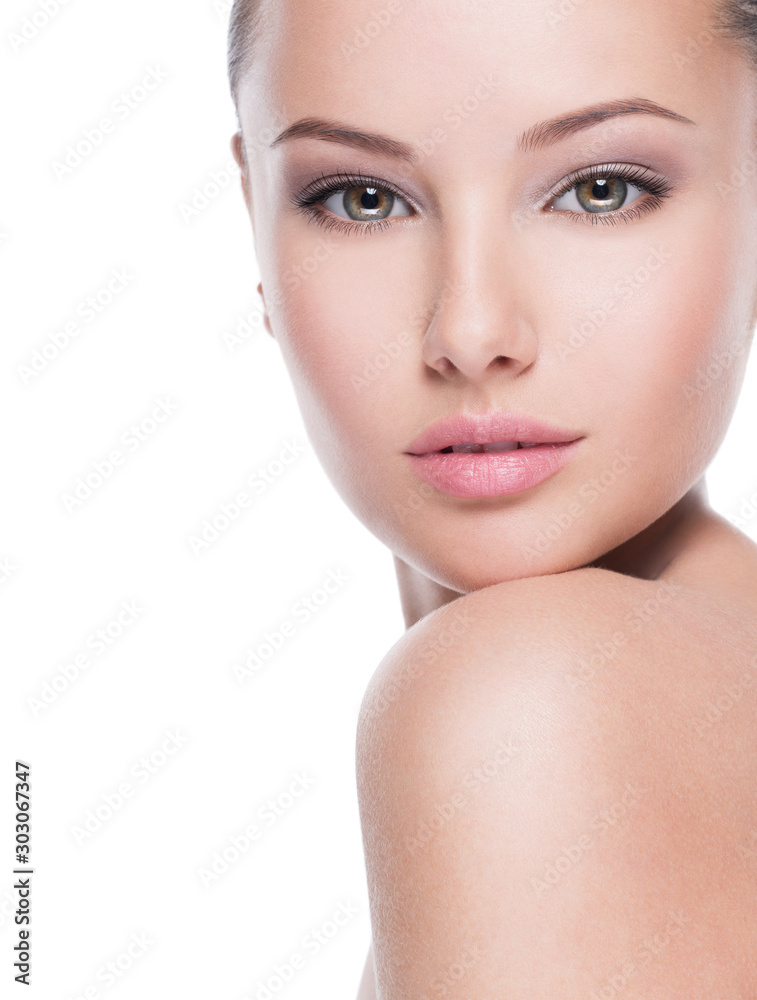 Beautiful face of young woman with perfect health fresh skin