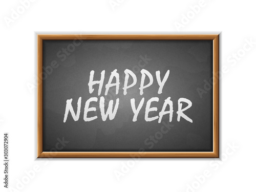 Happy new year written on a blackboard