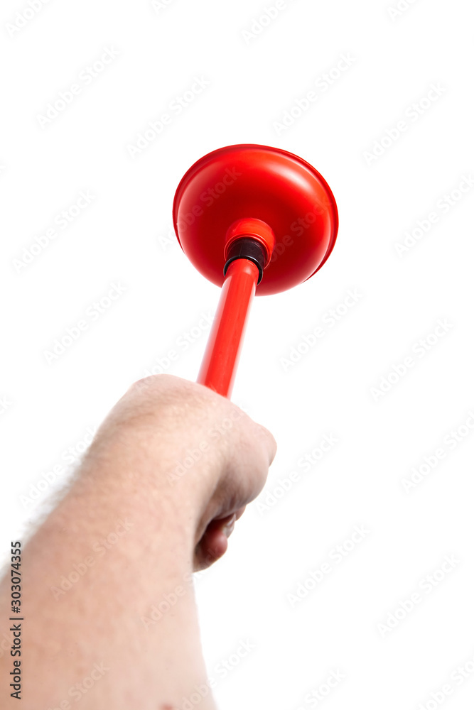 Hand holds a rubber plunger with red handle, isolated on white background. Tool for cleaning drain clogs
