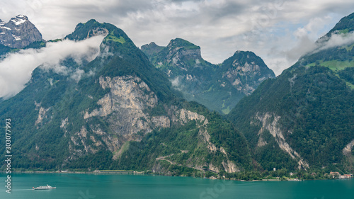 Fototapeta Naklejka Na Ścianę i Meble -  Switzerland, Panoramic view on green Swiss Alps and lake Lucerne near Isleten