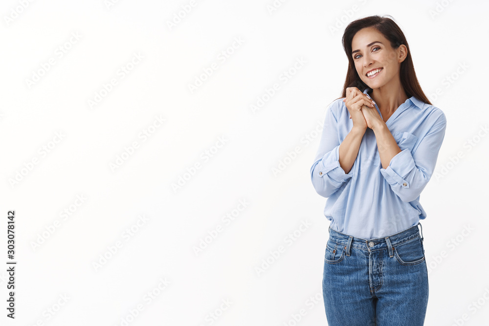 Tender middle-aged woman receive hearwarming gesture sighing romantically, smiling, clasp hands together, cherish cute moment, pleased children made surprise, stand white background grateful Tender middle-aged woman receive hearwarming gesture sighing romantically, smiling, clasp hands together, cherish cute moment, pleased children made surprise, stand white background grateful