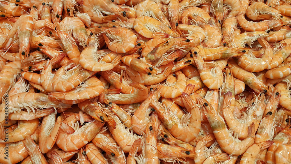 Raw fresh shrimp at the counter in the store Raw fresh shrimp at the counter in the store