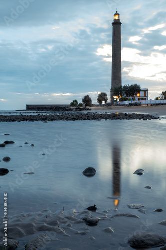 lighthouse on coast of sea