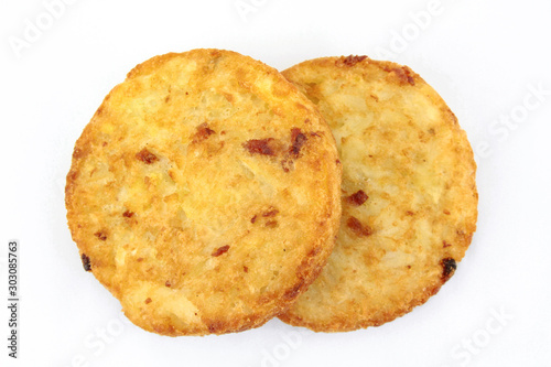 several rösti cooked on a white background