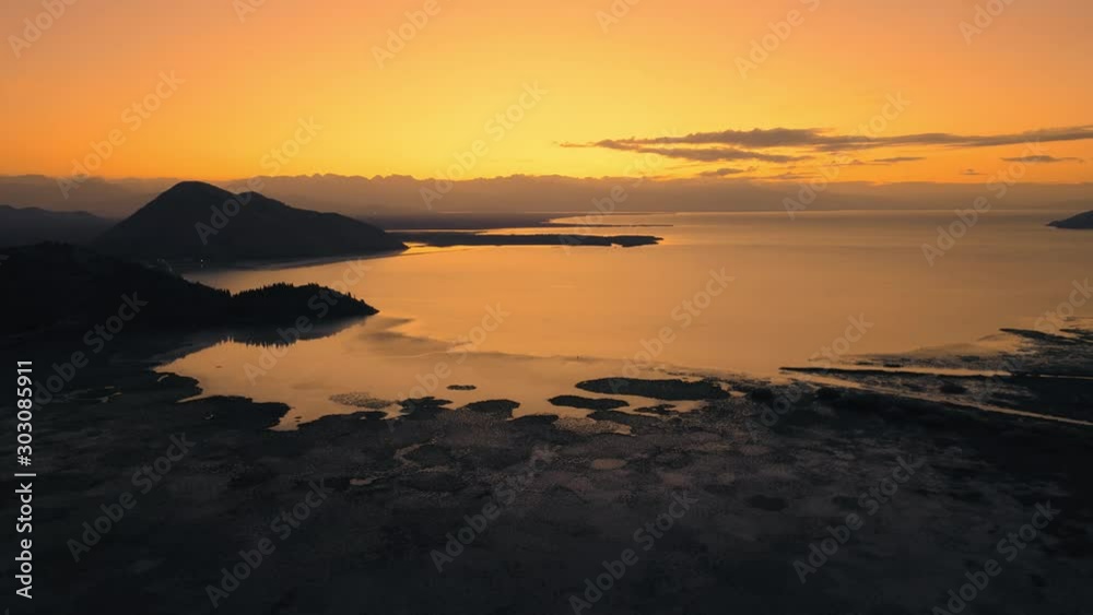 Sunrise at Lake Skadar, Montenegro. Dolly shot. Aerial, drone footage. Sunrise at Lake Skadar, Montenegro. Dolly shot. Aerial, drone footage.