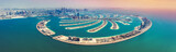 Aerial view on Palm Jumeira island in Dubai, UAE, on a summer day.