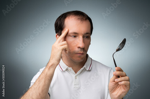 Man Using Telekinetic Powers photo