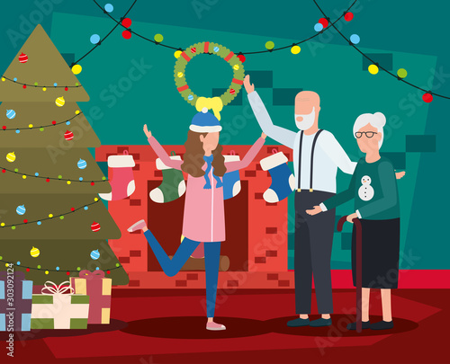 grandparents with granddaughter with christmas decoration