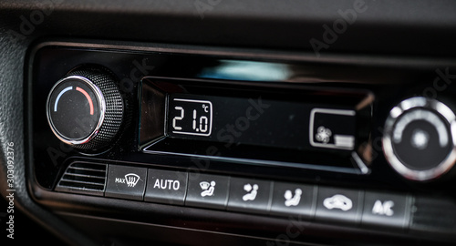 Car radio dashboard buttons like volume, climatronic, setup, sound. photo