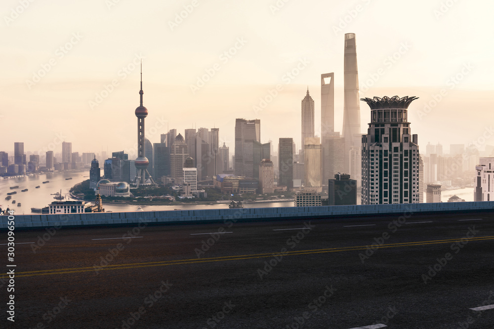 Fototapeta premium Asphalt road and urban building of Shanghai, driveway and road.