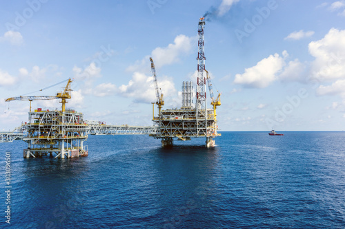 Offshore production platform connected with bridge at oil field