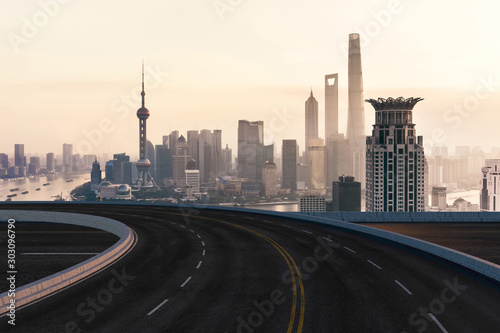 Asphalt road and urban building of Shanghai  driveway and road.