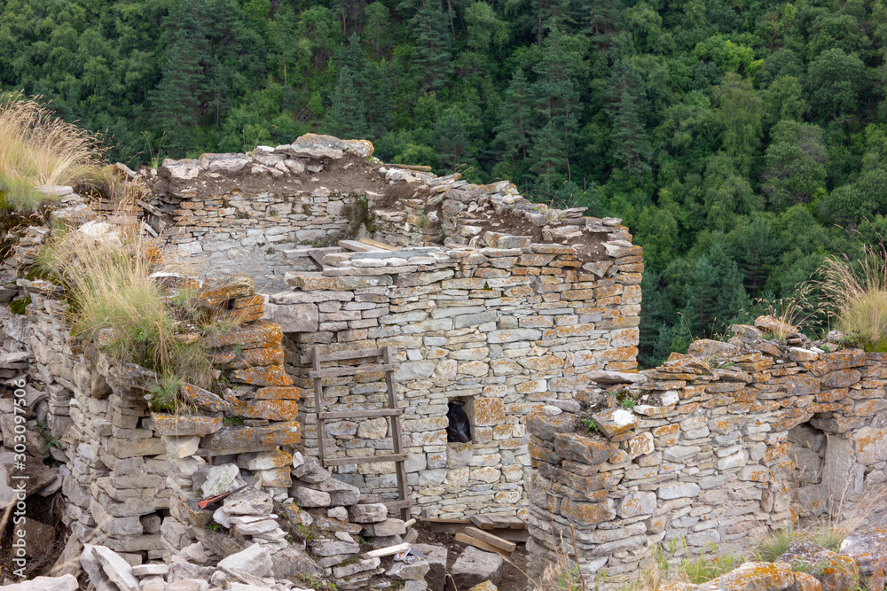 Ruins of medieval fortress. Outskirts of Khoy village which located on the bank of Ahkhete river. Chechnya (Chechen Republic), Russia, Caucasus. Ruins of medieval fortress. Outskirts of Khoy village which located on the bank of Ahkhete river. Chechnya (Chechen Republic), Russia, Caucasus.