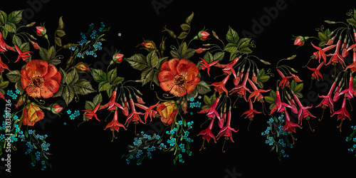 Embroidery. Wild roses, meadows herbs and red fuchsia flowers.  Horizontal seamless pattern. Botanical garden art. Template for design of clothes, tapestry