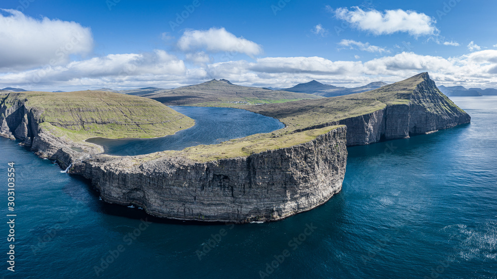Leitisvatn lake and Bosdalafossur waterfall on Vagar island aerial view, Faroe Islands