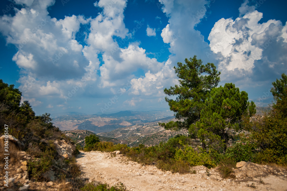 The top of the mountain gives the tourist a beautiful view of the Troodos Mountains, and the local peasants - a Sunny place for a vineyard. The top of the mountain gives the tourist a beautiful view of the Troodos Mountains, and the local peasants - a Sunny place for a vineyard.
