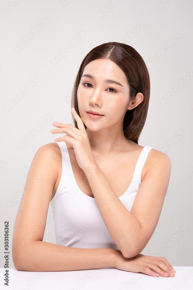 Beautiful Asian young woman touching soft cheek smile with clean and fresh skin Happiness and cheerful with positive emotional,isolated on white background,Beauty and Cosmetics Concept Beautiful Asian young woman touching soft cheek smile with clean and fresh skin Happiness and cheerful with positive emotional,isolated on white background,Beauty and Cosmetics Concept