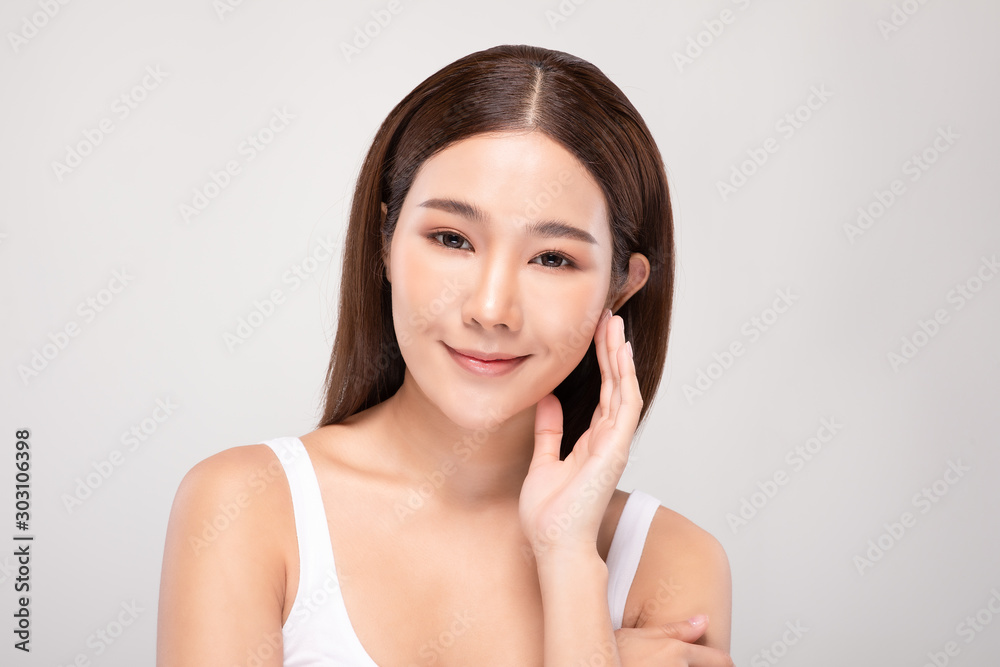 Beautiful Asian young woman touching soft cheek smile with clean and fresh skin Happiness and cheerful with positive emotional,isolated on white background,Beauty and Cosmetics Concept Beautiful Asian young woman touching soft cheek smile with clean and fresh skin Happiness and cheerful with positive emotional,isolated on white background,Beauty and Cosmetics Concept