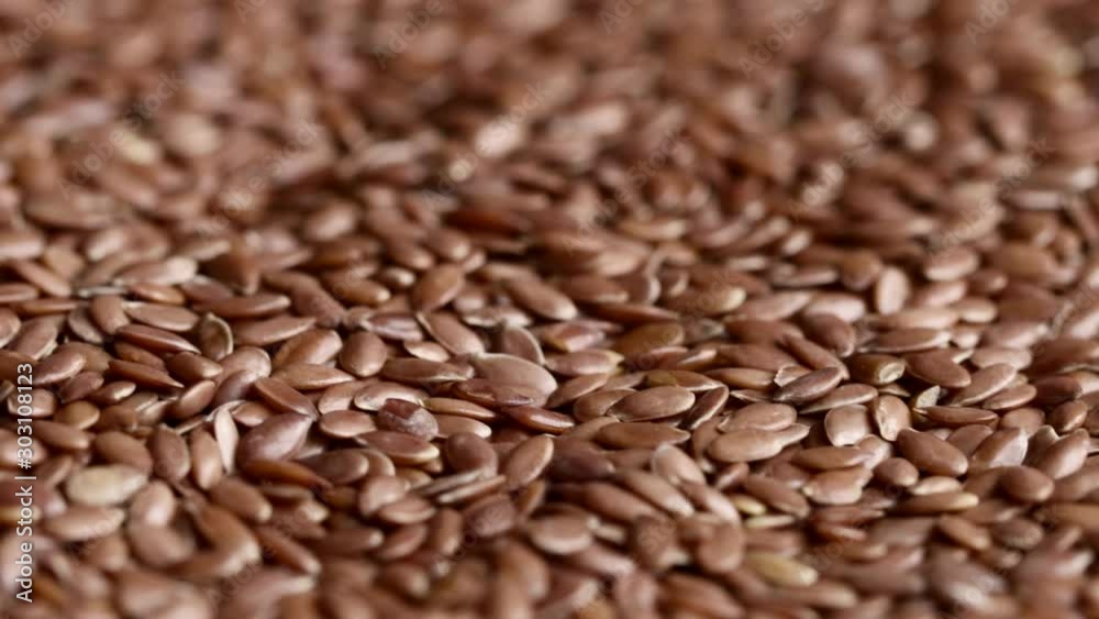 Close up of raw flaxseeds rotating