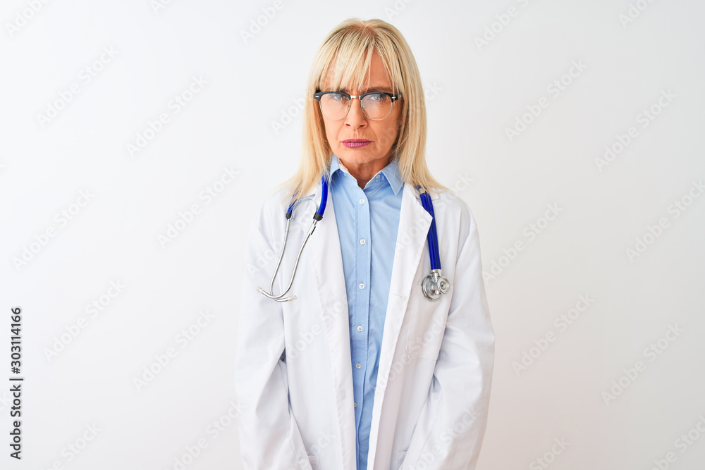Middle age doctor woman wearing glasses and stethoscope over isolated white background skeptic and nervous, frowning upset because of problem. Negative person. Middle age doctor woman wearing glasses and stethoscope over isolated white background skeptic and nervous, frowning upset because of problem. Negative person.