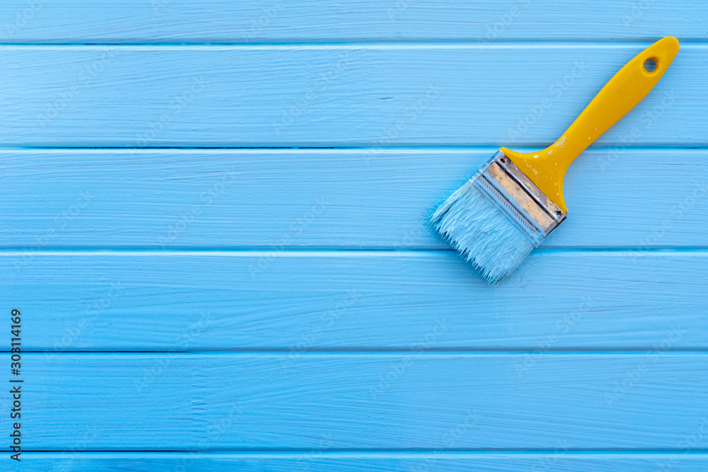 paint brush on wood background