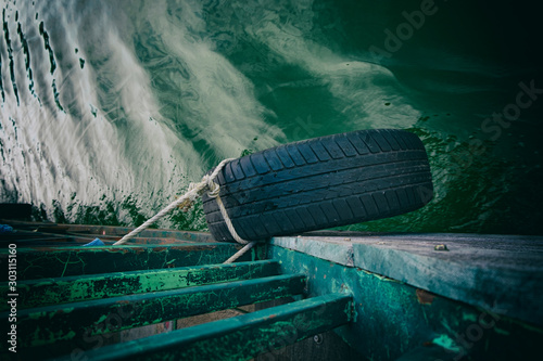 close up of a tyre on a boat to protect from scratches and breaking.
