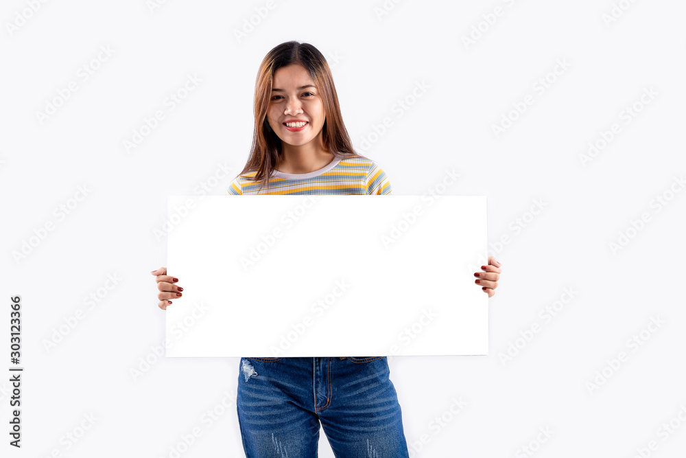Portrait of young woman holding empty blank white board with clipping path on white background. Asian woman displaying white banner. Your text here Portrait of young woman holding empty blank white board with clipping path on white background. Asian woman displaying white banner. Your text here