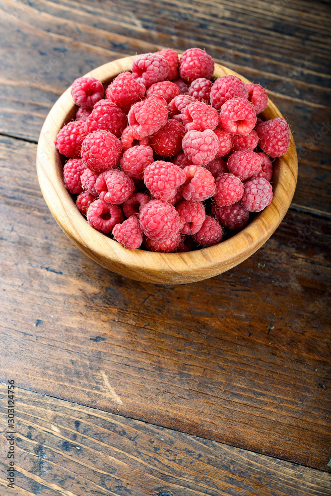 ripe raspberries on the table ripe raspberries on the table