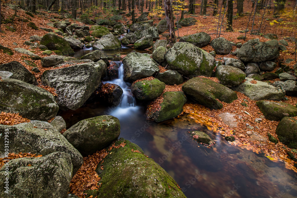 Autumn mood in nature by waterfalls in Jizera Mountains, Czech Republic