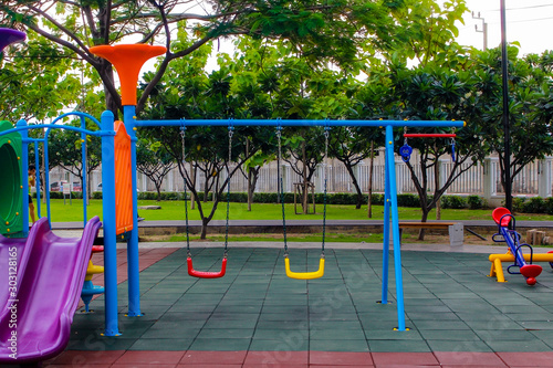 View playground in garden park colorful playground for children
