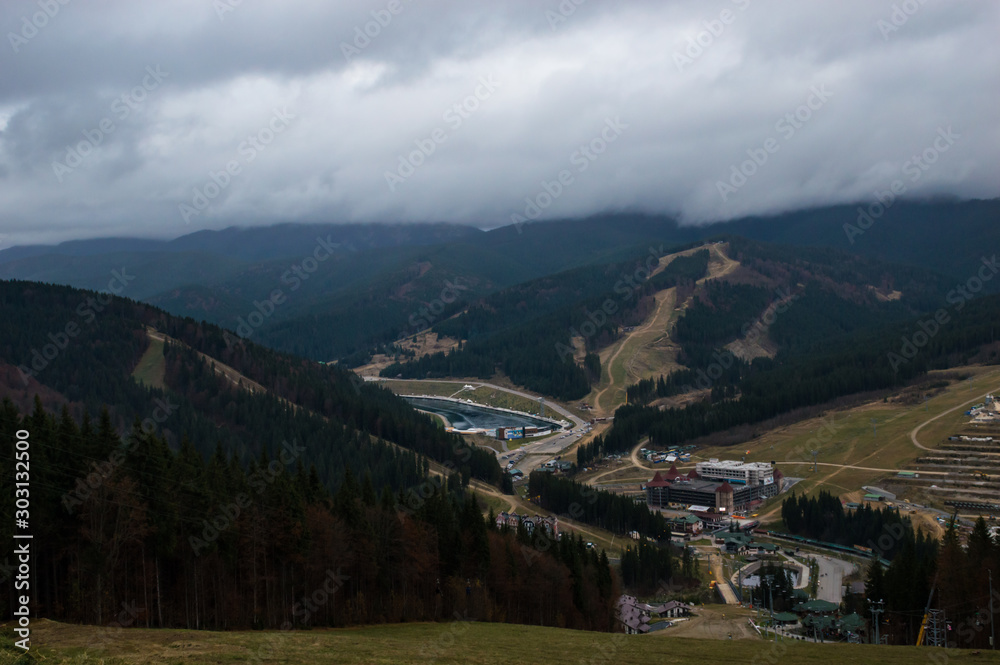 Naklejka premium Autumn landscape background in the rain weather with fog