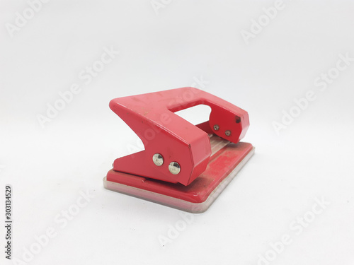 Handheld Colorful Metallic Mechanical Paper Hole Puncher for Office and Home Supplies Appliances in White Isolated Background