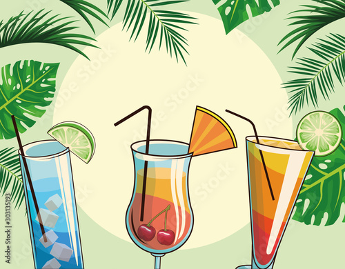 tropical cocktails drinks over tropical leaves and retro style background