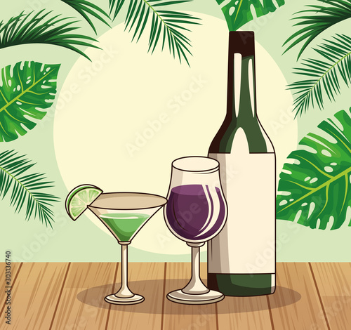 liquor bottle and cocktails over tropical leaves and retro style background