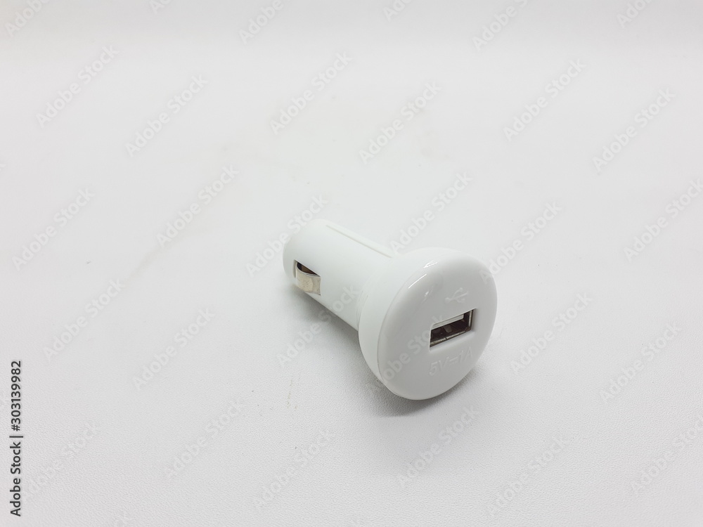 5 Volt DC Electrical Compact Universal Luxury Clean Colored Design USB Car Charger in White Isolated Background 5 Volt DC Electrical Compact Universal Luxury Clean Colored Design USB Car Charger in White Isolated Background