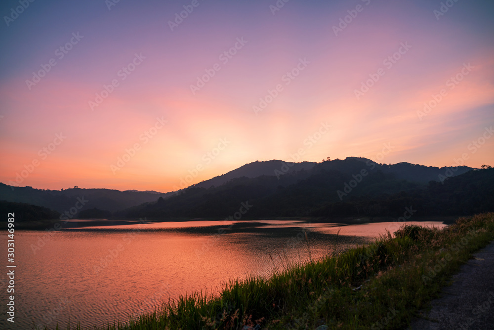 Long exposure image of Dramatic sky in sunset or sunrise scenery background