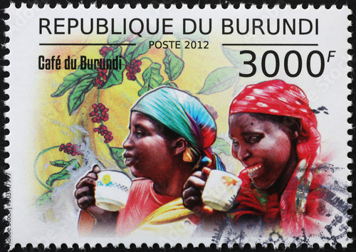 Women drinking coffee on stamp of Burundi photo