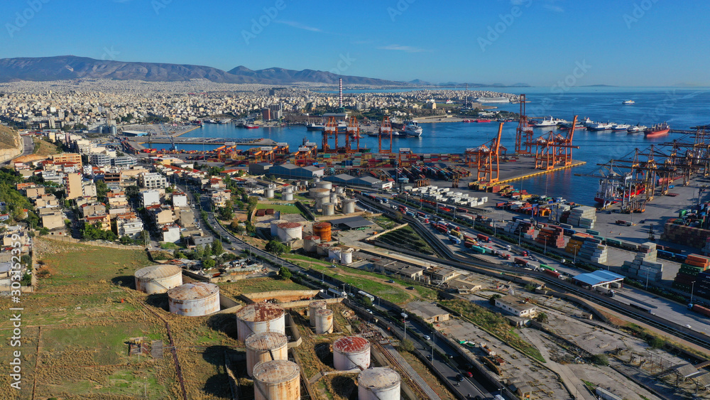 Aerial drone photo of industrial cargo container terminal near Perama and commercial port of Piraeus, Attica, Greece