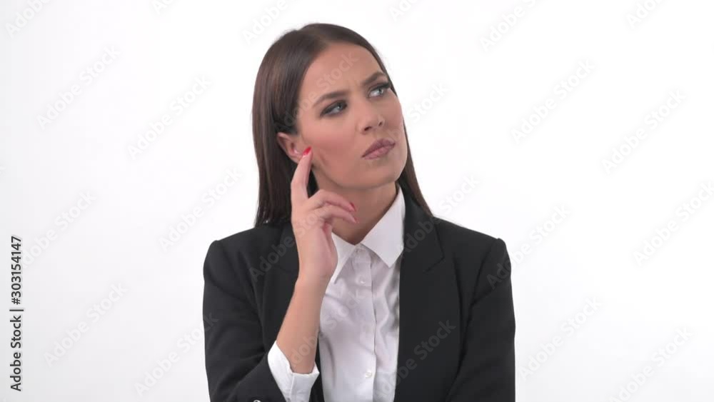 Uncertain young business woman thinking and looking up having idea enlightenment. Headshot portrait over white studio background. Uncertain young business woman thinking and looking up having idea enlightenment. Headshot portrait over white studio background.